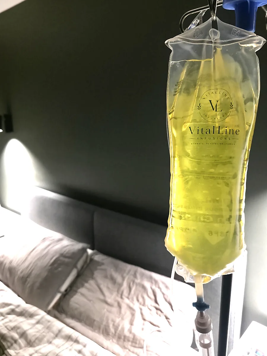 A VitalLine Infusions appointment set up bedside in a client's home